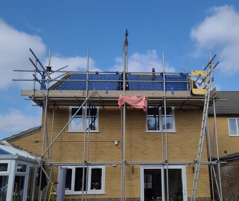Installing solar panels on a house